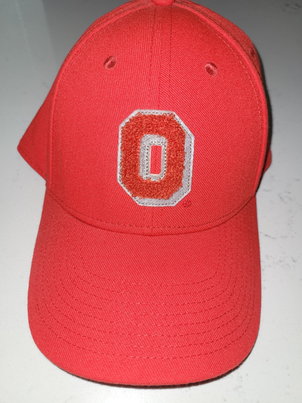 Red Baseball Cap with 'O' Patch